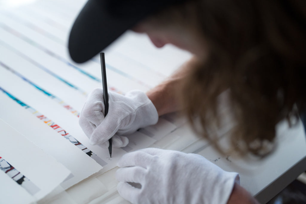 Chris adding 1 of editions to his limited release prints